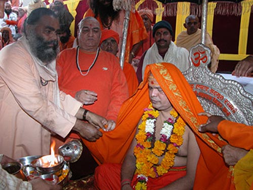 Swamiji is receiving Holy Guruji\'s chadar