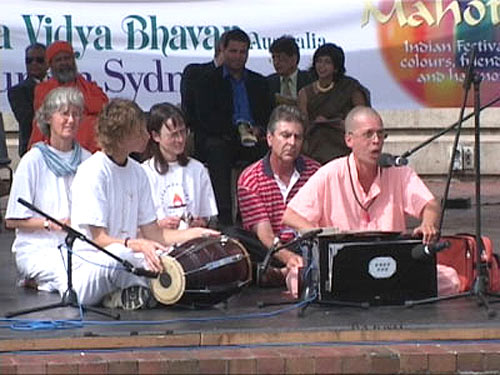 Swami Gajanand sings at the celebration of the Holi festival